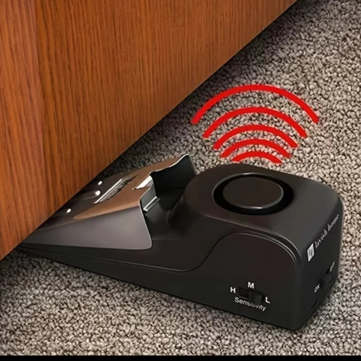 Roamsafe alarm doorstop behind a door