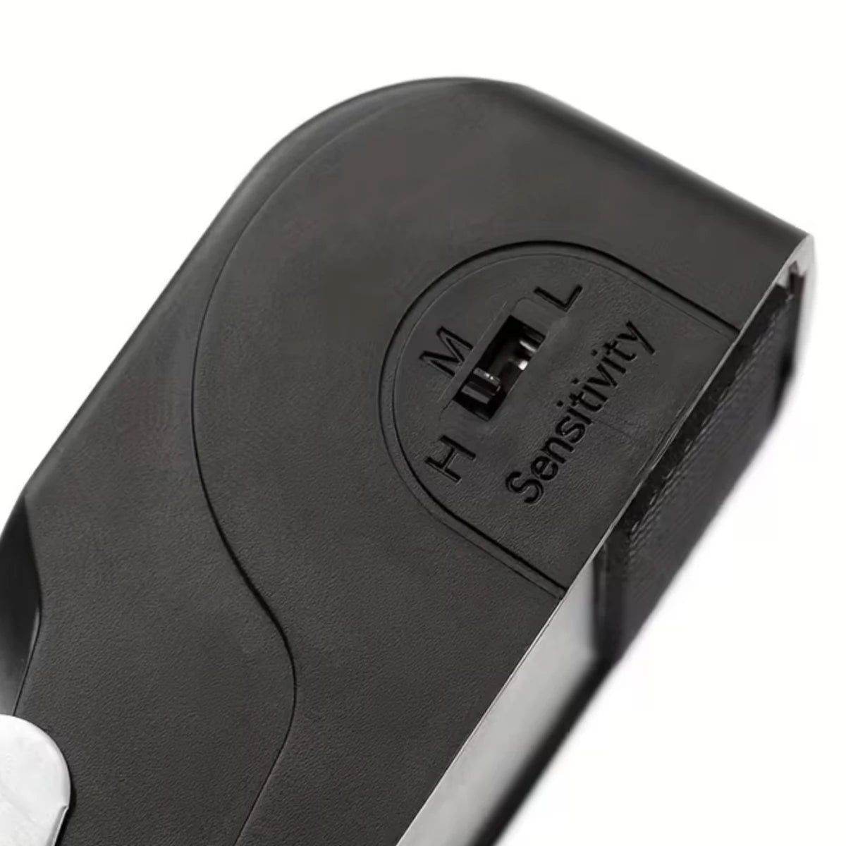 Close-up of the Roamsafe alarm sensitivity switch